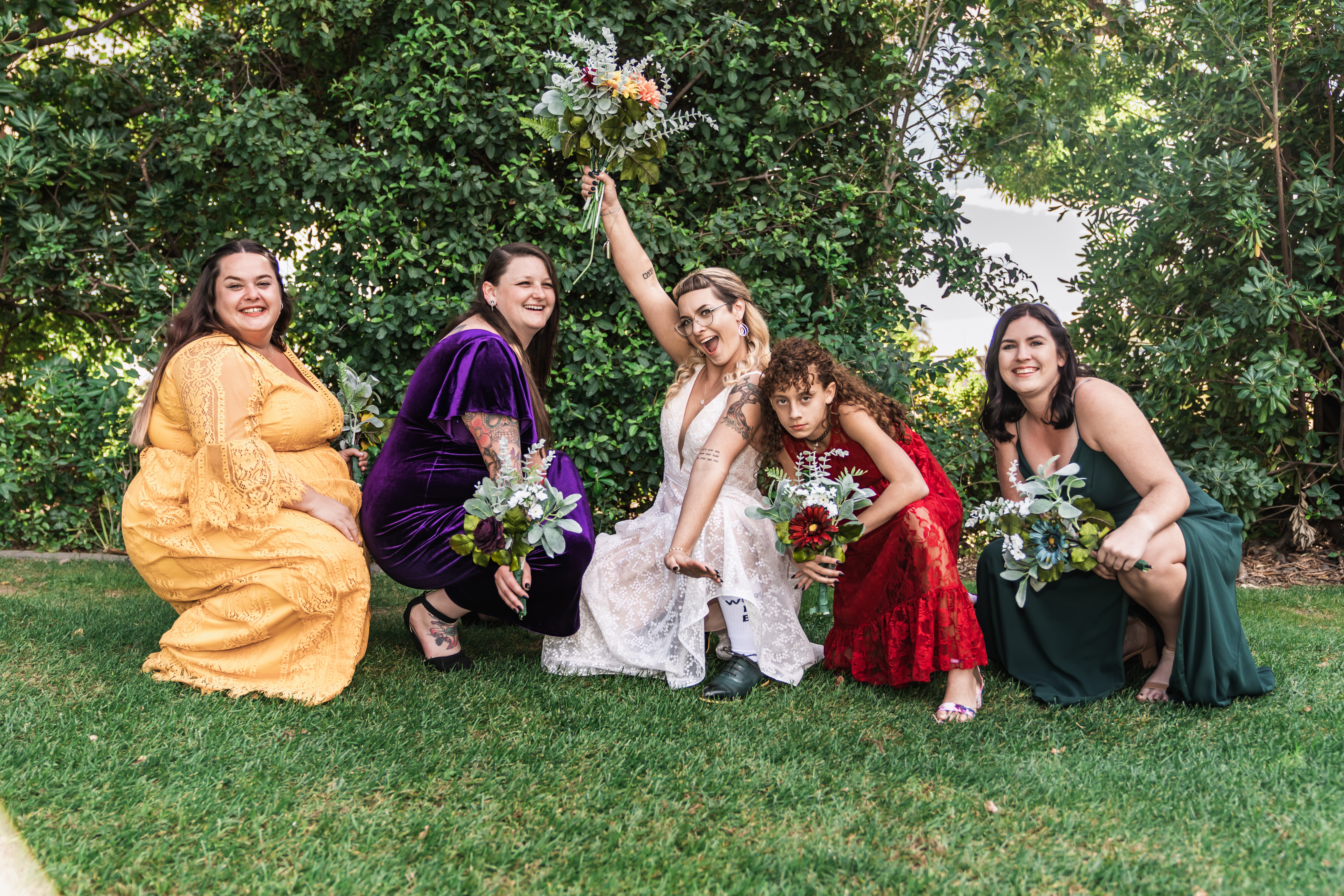 bride with wedding party - 15 Ways to Make Your Wedding More Inclusive