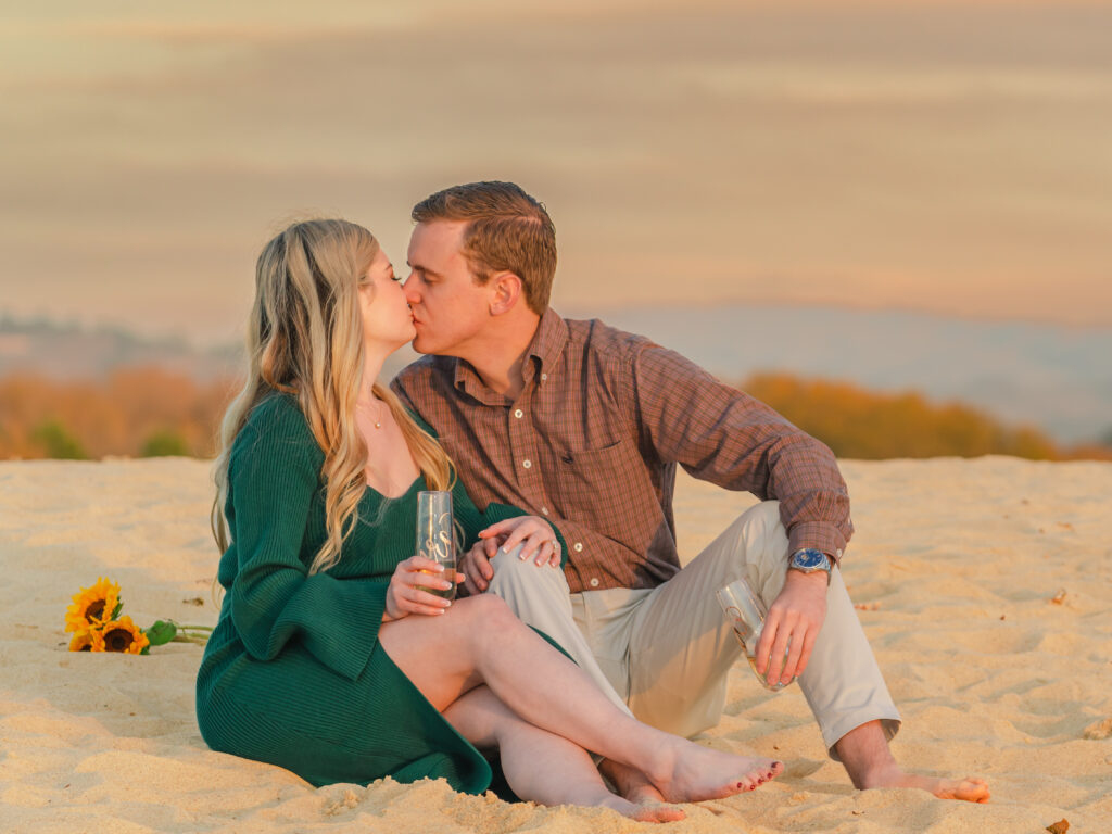 Engagement photo on the beach at the sunset during fall season by 4Karma Studio